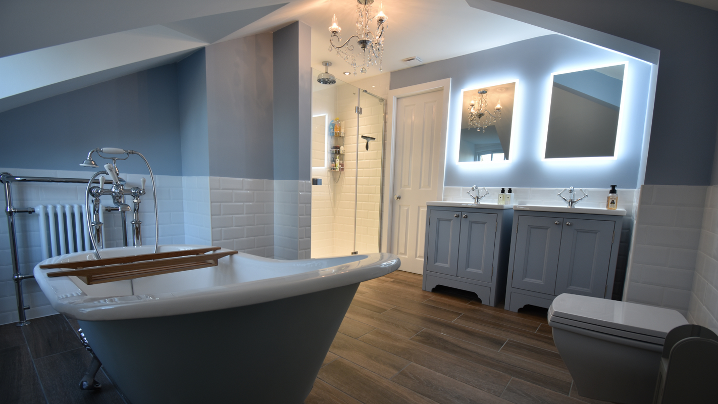 Luxury Victorian style bathroom renovation with statement roll top bath