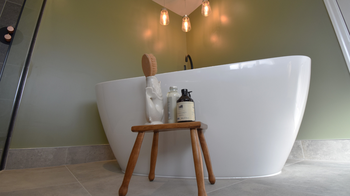 Spacious, tranquil bathroom retreat with Waters Spa Bath