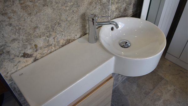 RAK petit round washbasin with left ledge