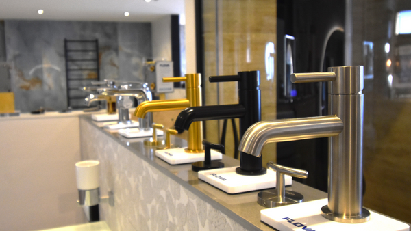 Flova showroom brassware samples in mixed colour finishes