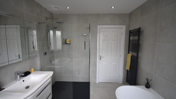 Bathroom with Pelipal drawer sink unit, Acquabella walk in shower with black beton tray