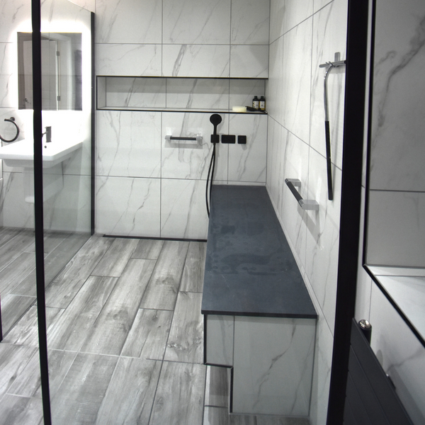 shower seating on wet floor with one and two metre screening