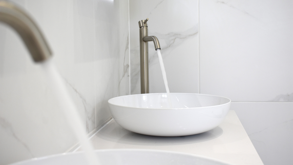 Kaldewei vessels with brushed steel tap and waste