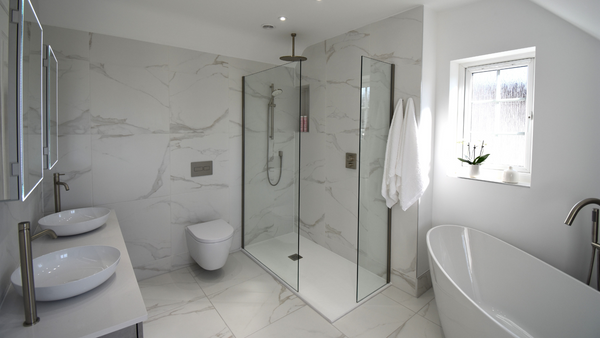 Walk in shower with textured base slate tray from Acquabella in Blanco