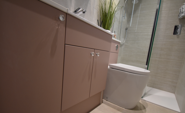 Avalon matt rose cabinetry with crystal handle and wc