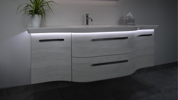 Two drawer two door vanity unit in oak white horizontal effect with mineral marble washbasin and LED lighting