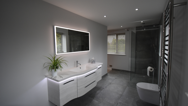 Two drawer two door vanity unit in oak white horizontal effect with mineral marble washbasin and Vega mirror with LED lighting