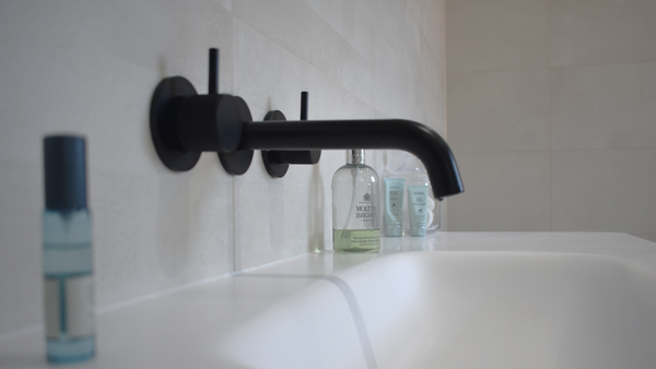 Abacus Iso Pro wall mounted basin taps in Matt Black