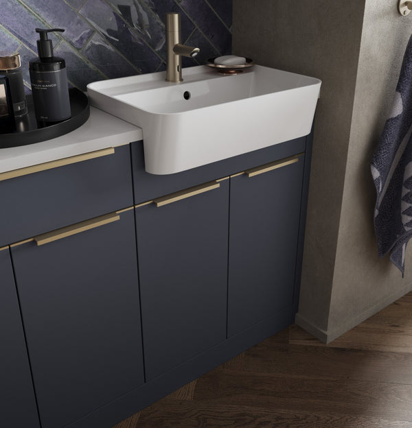 Symphony Novara indigo sink unit with gold fittings